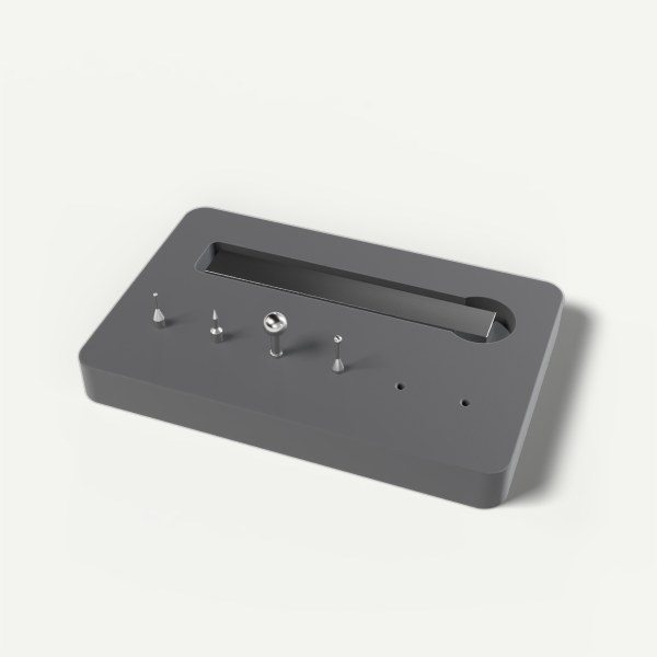 Tip box insert in black acetal holding the three measuring tips and the swap tool